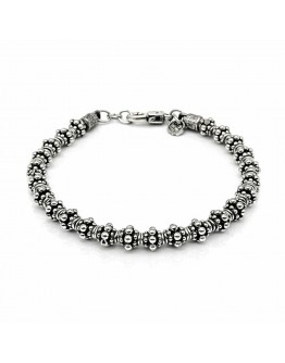 BRACCIALE CON ELEMENTI PASSANTI PUNTINATI 