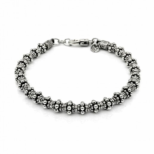 BRACELET WITH DOTTED THROUGH ELEMENTS